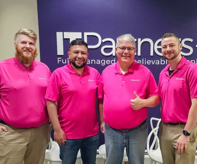 The ITPartners+ Grand Rapids Tech Team Wearing All Pink
